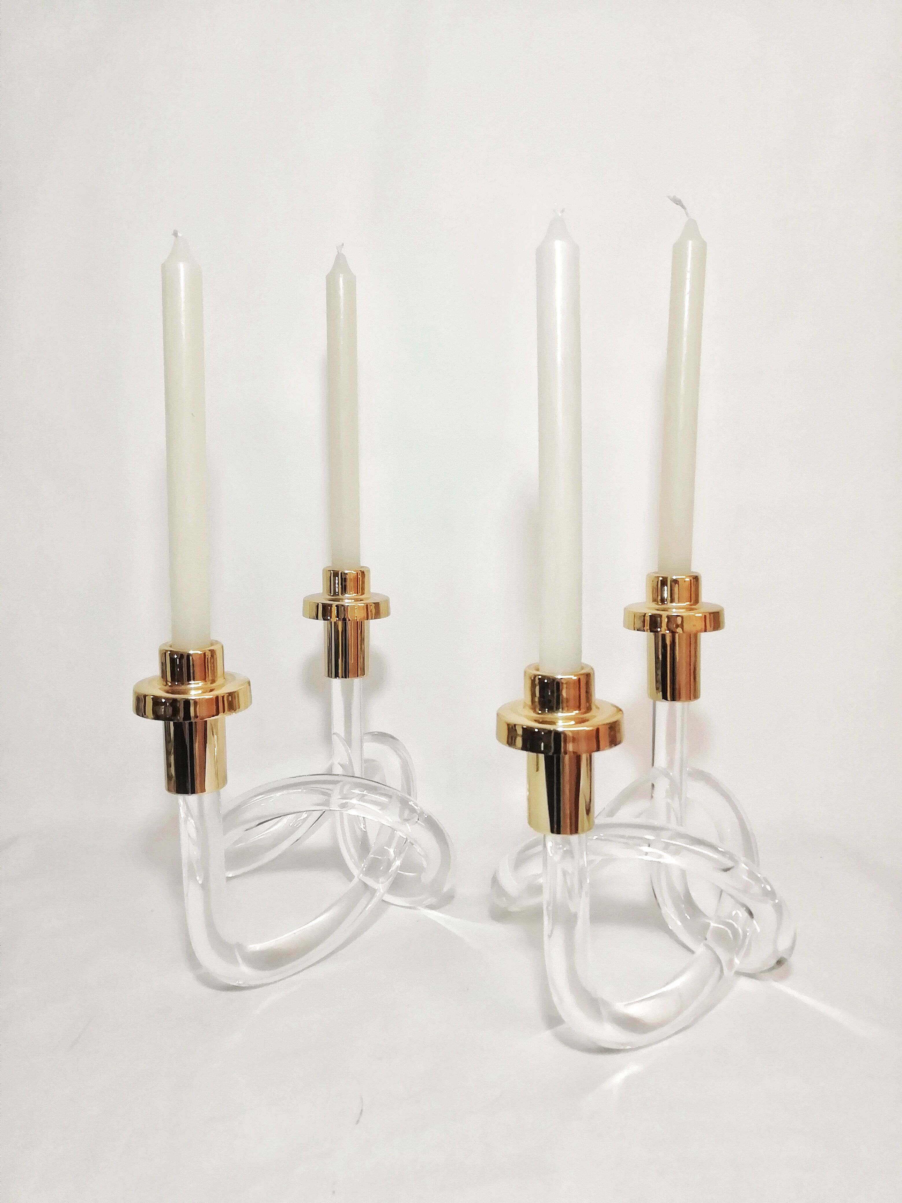 Pair of Dorothy Thorpe's pretzel chandeliers