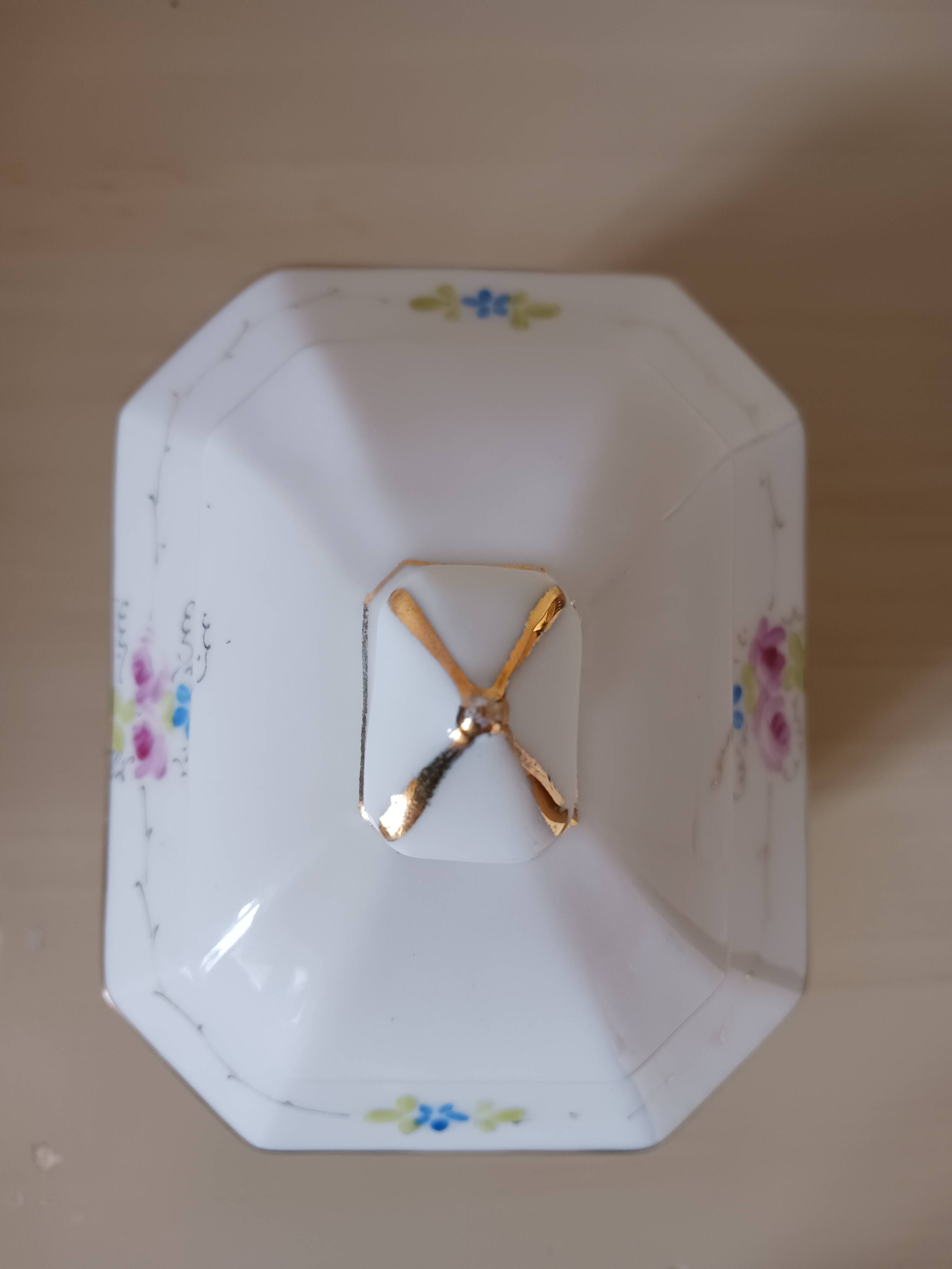 Vintage porcelain sugar bowl.