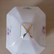 Sucrier vintage en porcelaine .