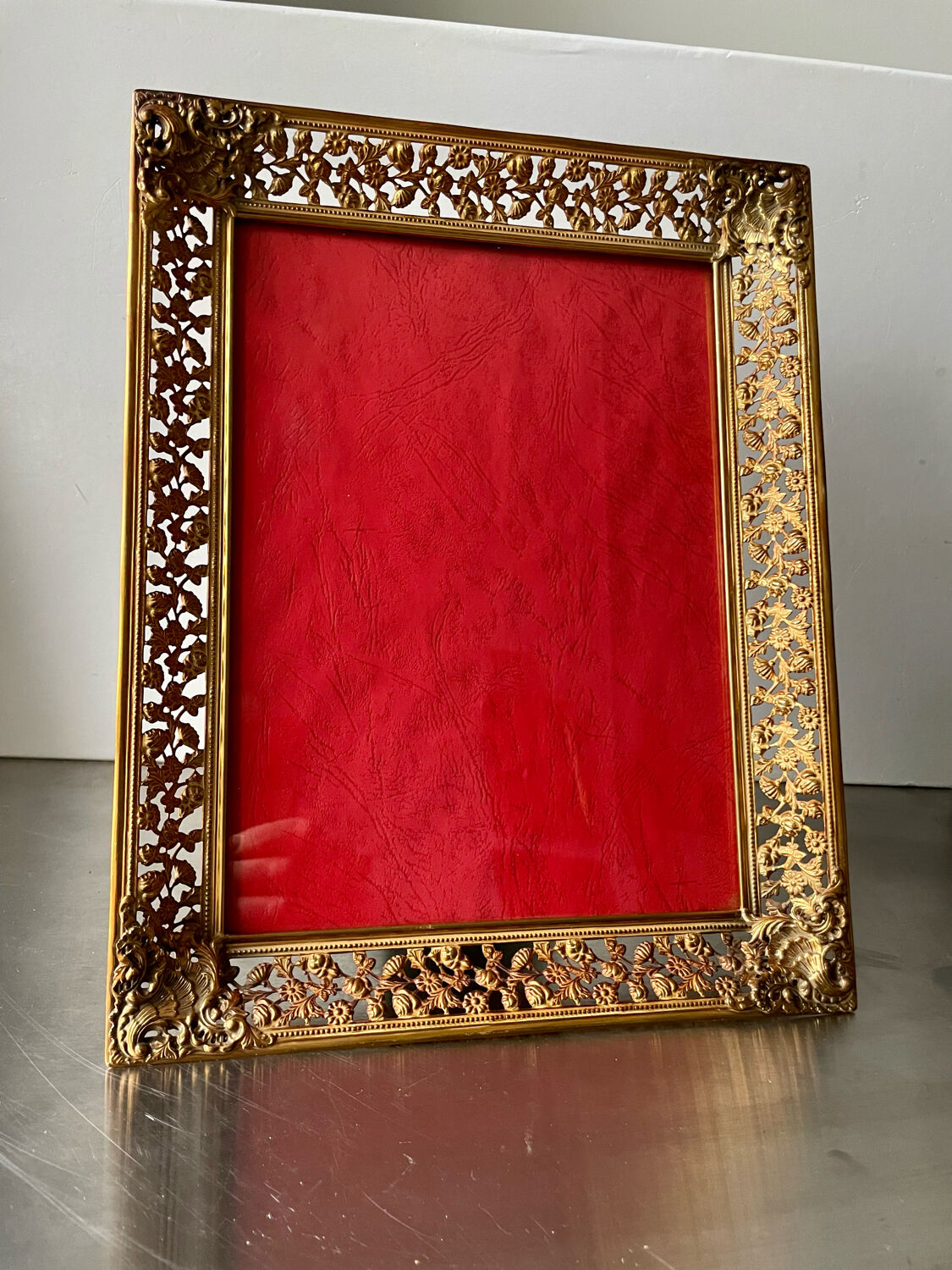 Antique xl metal frame in gold colored brass 29.5 cm x 23 cm convex glass