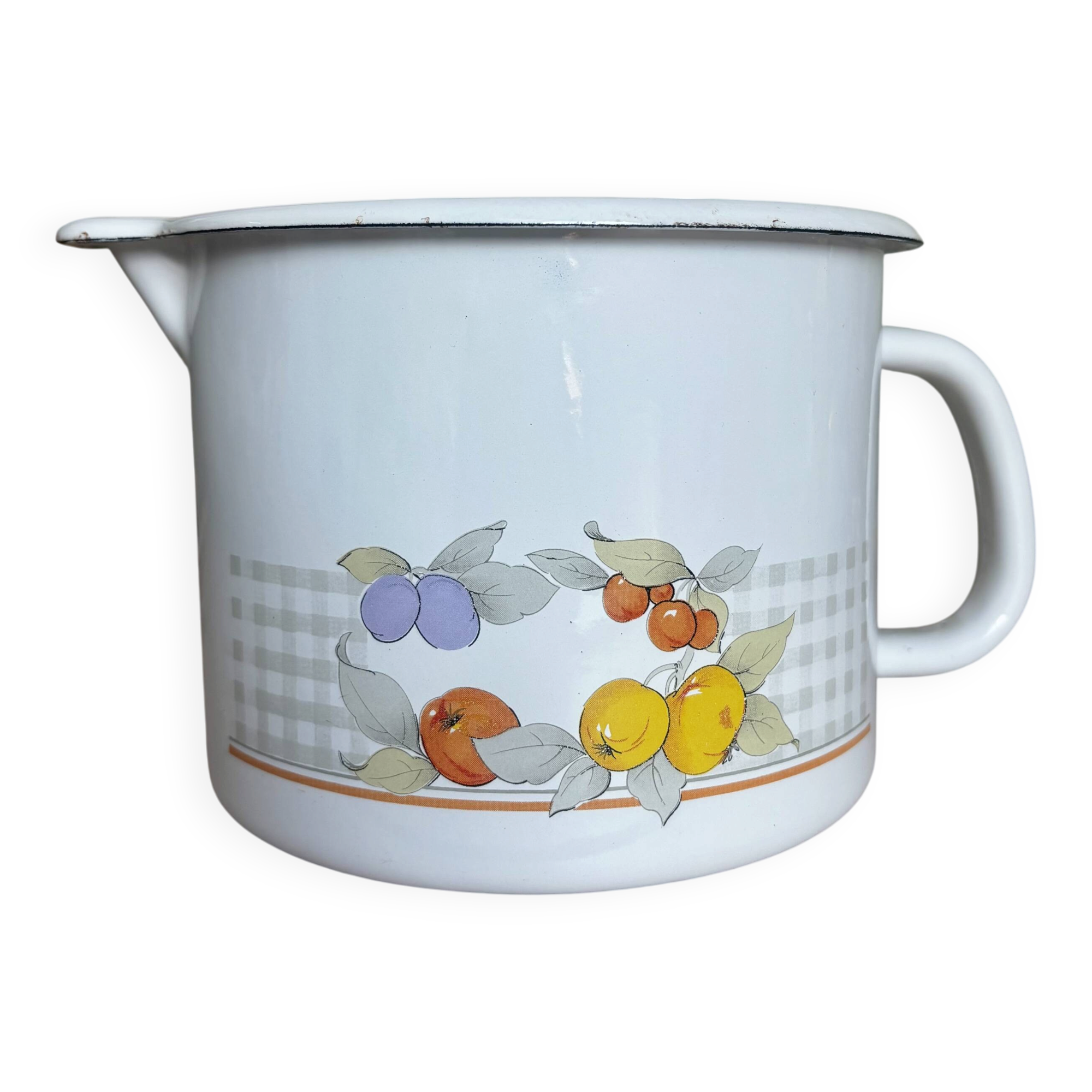 Vintage enamelled white metal milk jug with fruits.