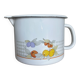 Vintage enamelled white metal milk jug with fruits.