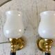 Pair of opaline and golden brass wall lamps art deco style 30s