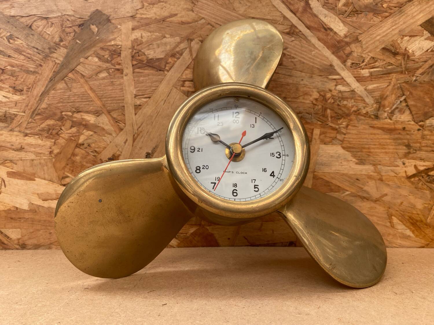 Antique brass propeller with pendulum vintage nautical wall clock