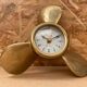 Antique brass propeller with pendulum vintage nautical wall clock