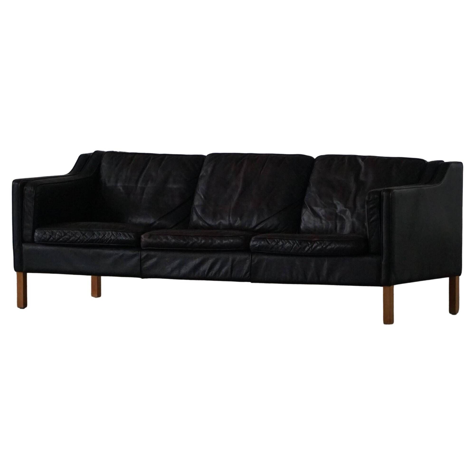 Mogens Hansen, mid-century 3-seater sofa, patinated black leather, 1970s.