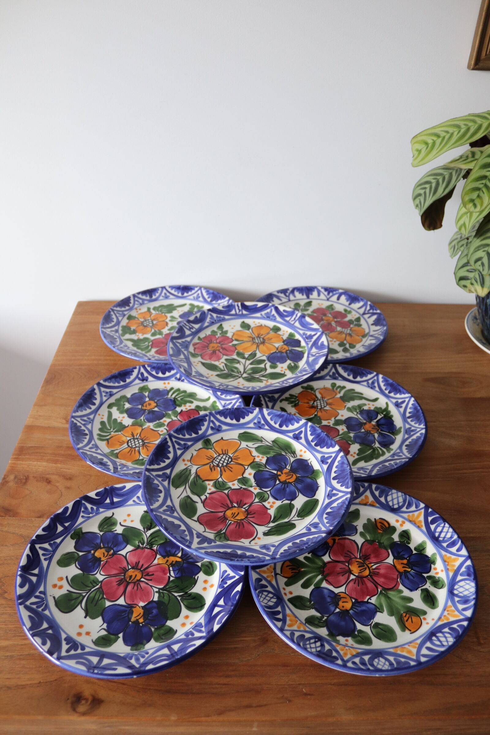 8 hand-painted plates