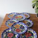 8 hand-painted plates