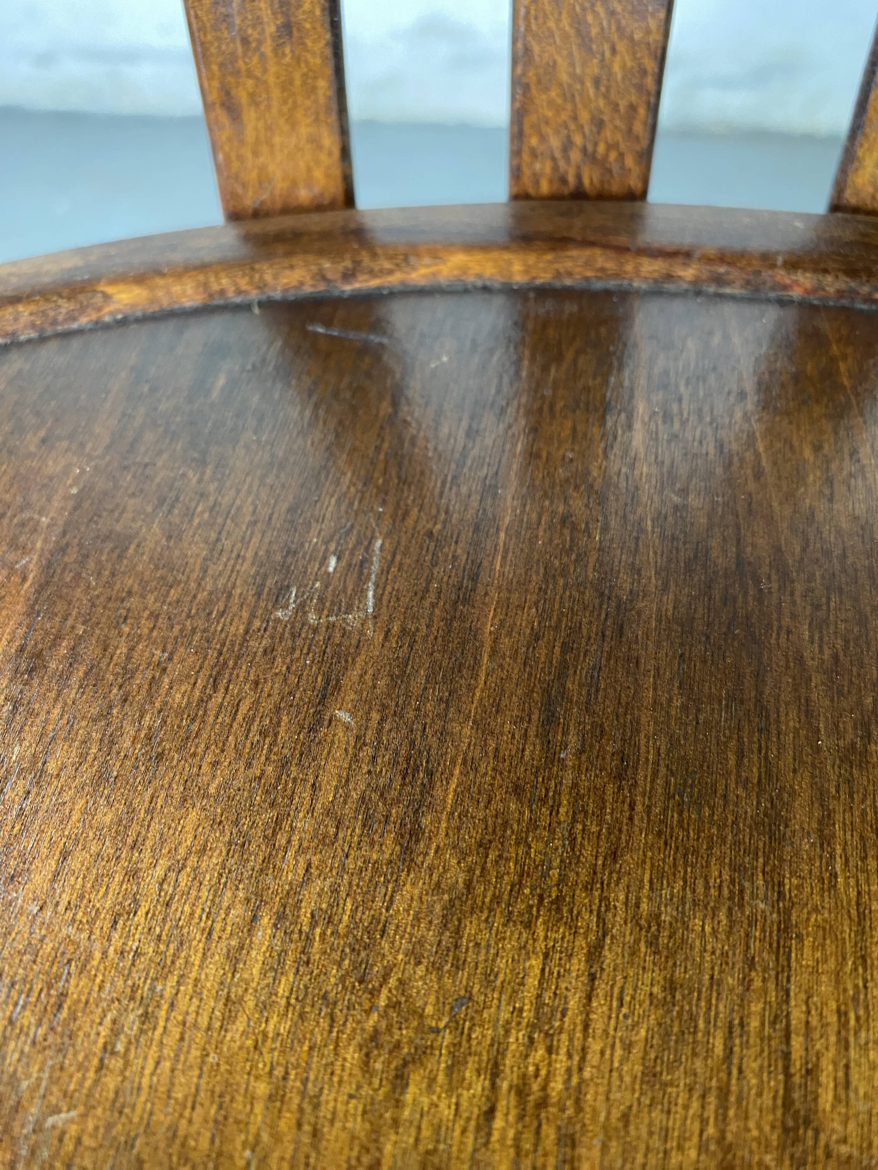 Baumann rotating wooden armchair