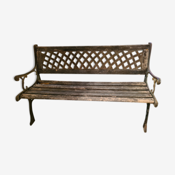 Old garden bench made of metal and wood