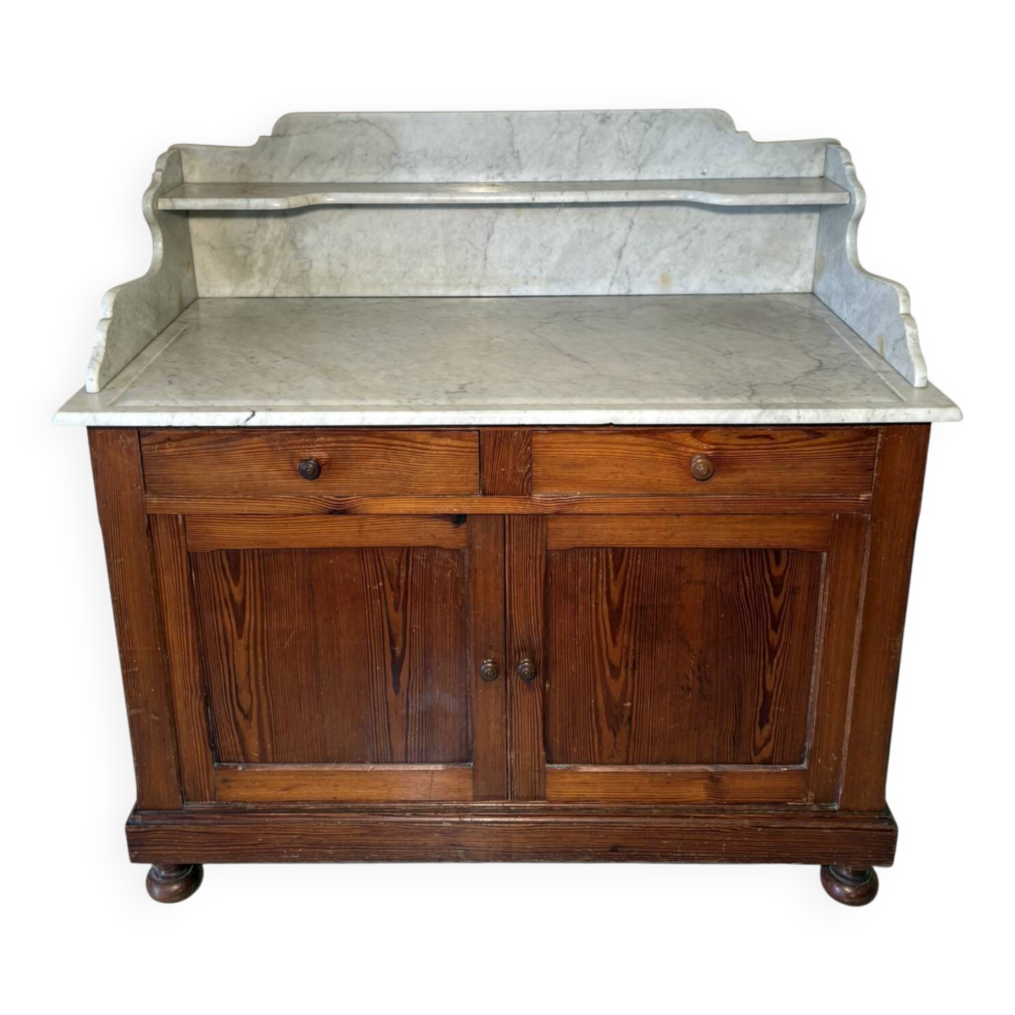 Antique wood and marble kitchen sideboard with carved backsplash