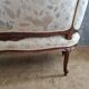 Small sofa or bench in Louis XV style, rococo.