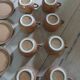 8 tasses anciennes avec soucoupes en grès