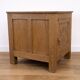 Oak side cabinet with carved motifs