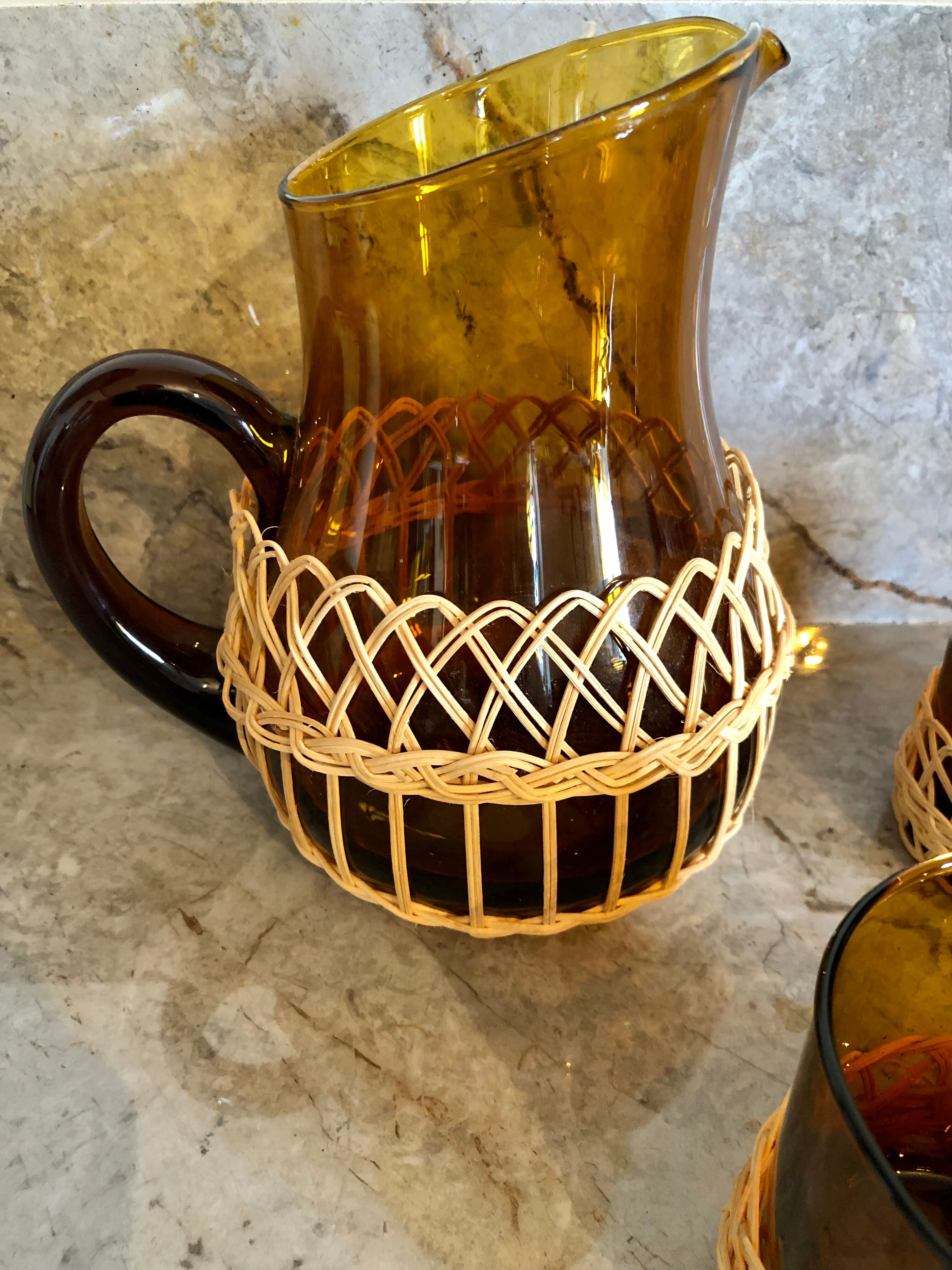 Pitcher and amber glasses and rattan