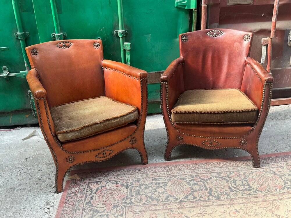 Lounge chairs and ottoman attributed to Otto Schultz for Boet AB, Sweden, 1930s, set of 3