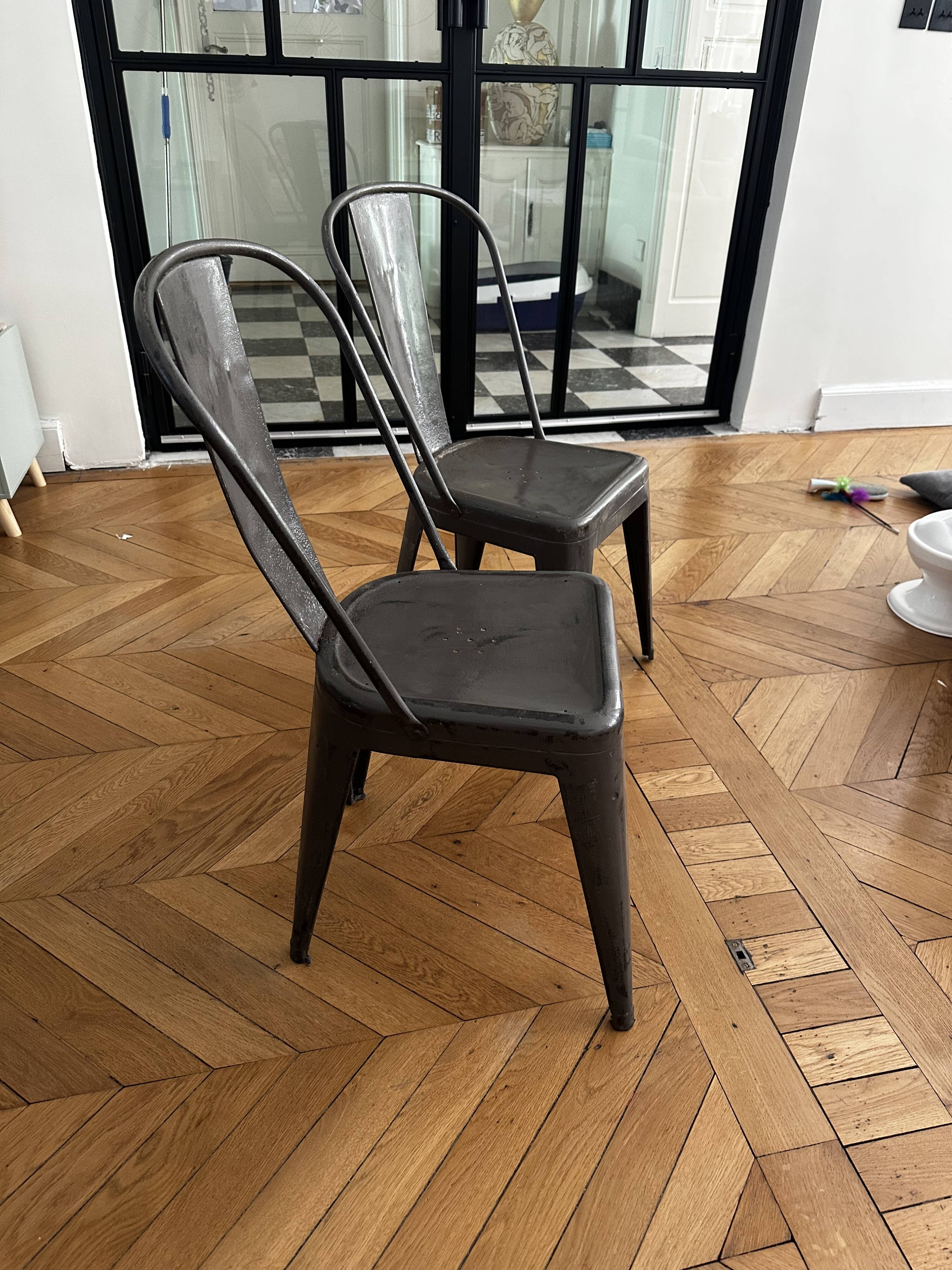 Pair of vintage Tolix model A chairs, designed by Xavier Pauchard.