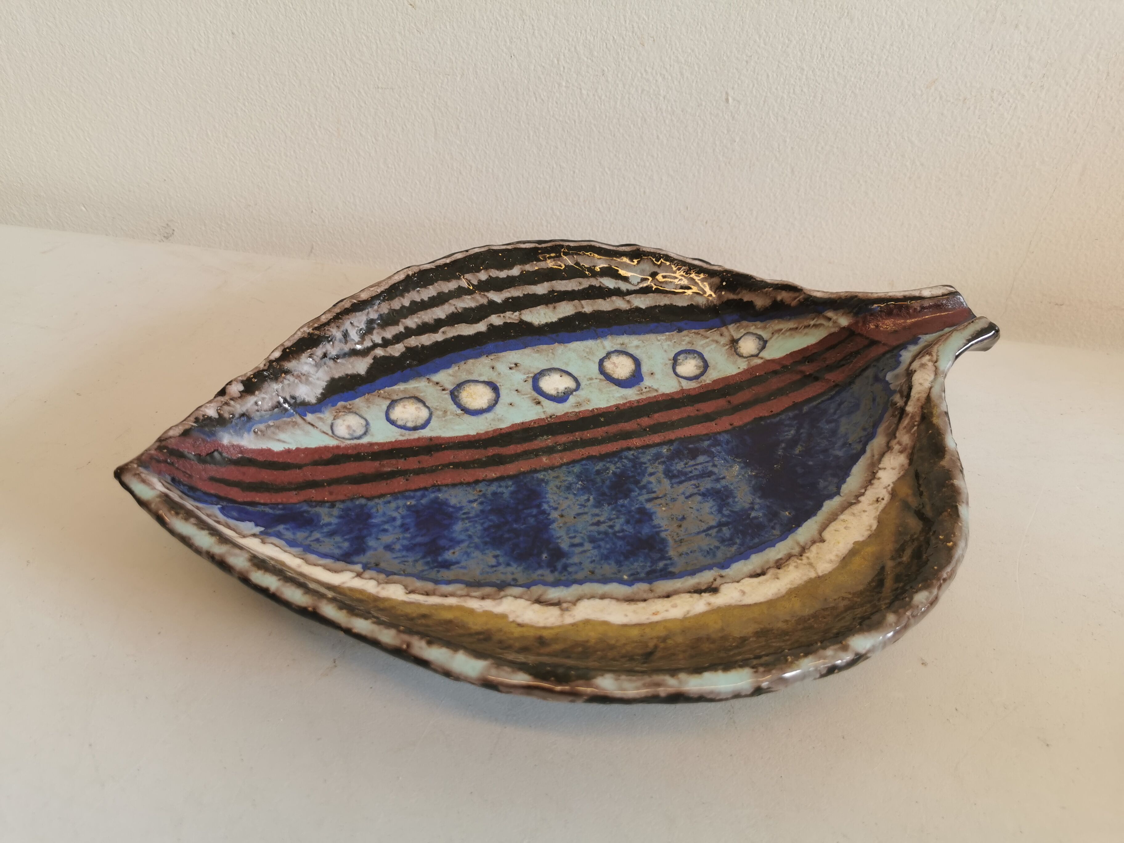 Danish ceramic dish shaped like a leaf.