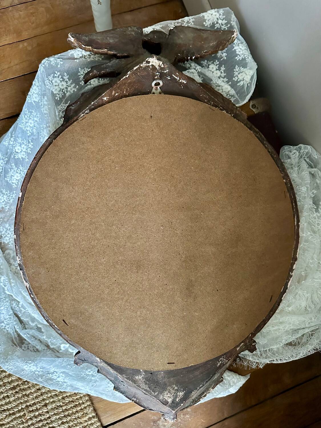 Antique gilded mirror decorated with an eagle