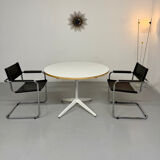 Extendable dining table designed by George Nelson for Herman Miller 60’