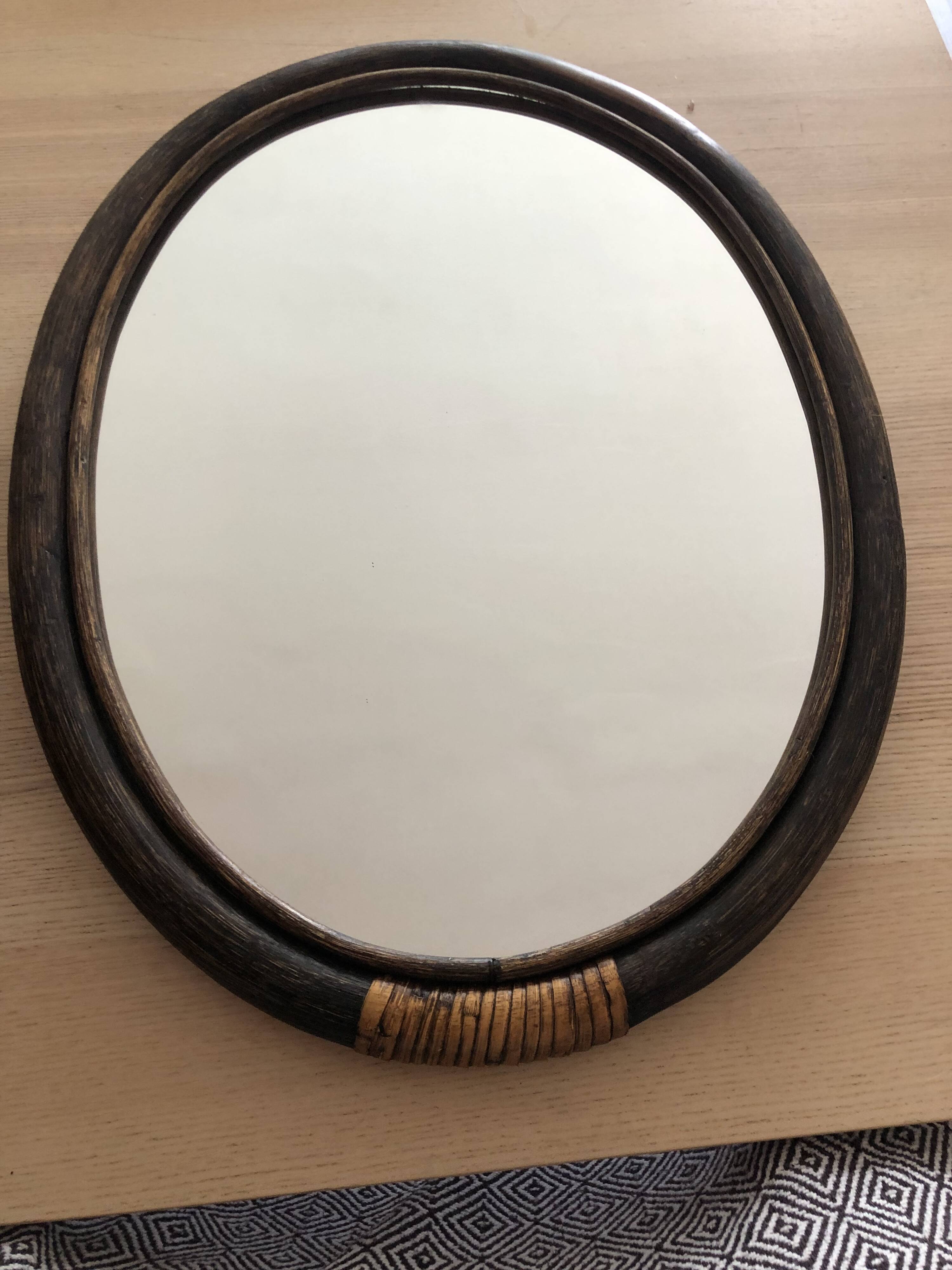 Oval rattan mirror