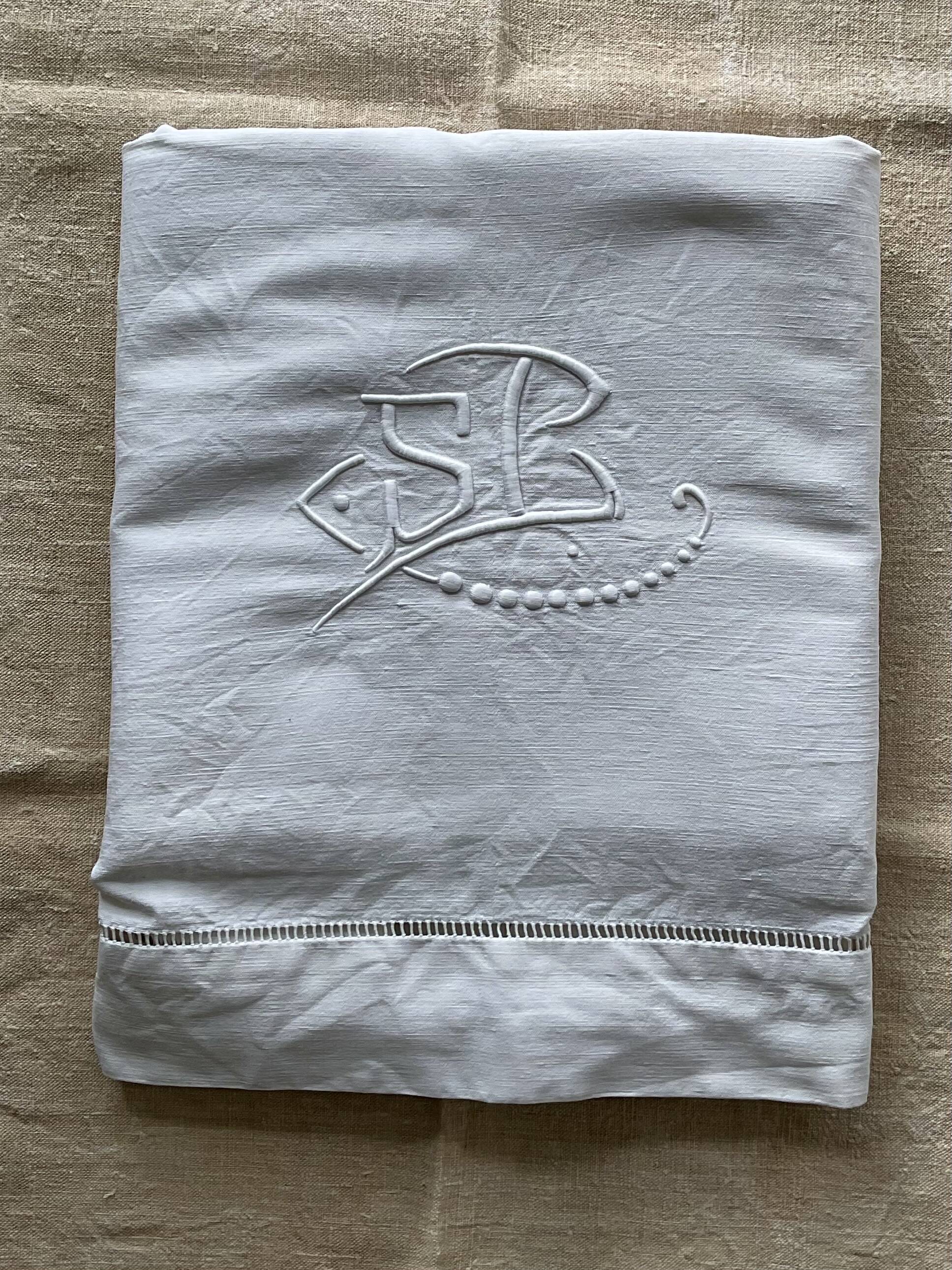 Old hand-embroidered cotton/linen sheet