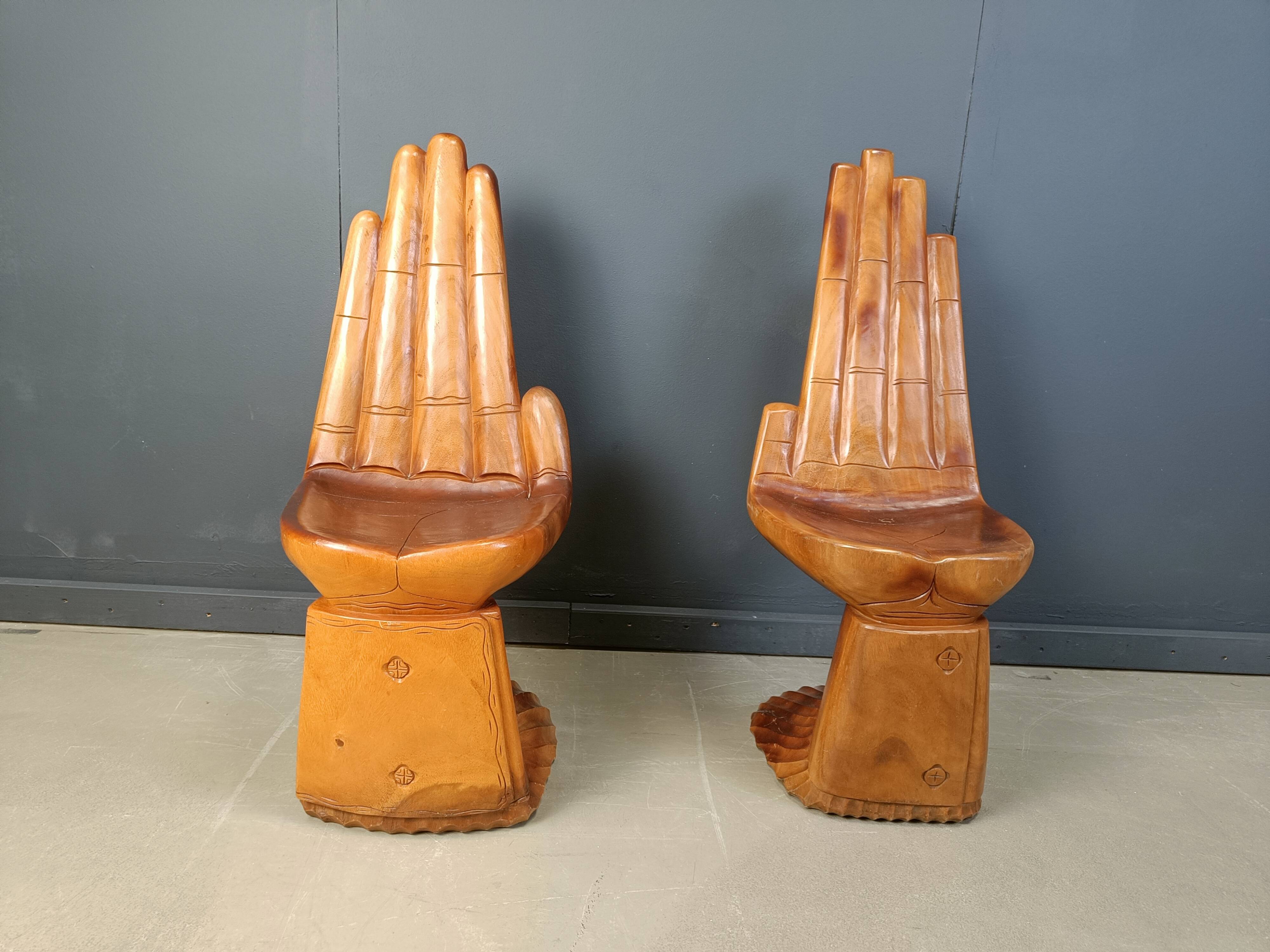 Pair of hand shaped teak chairs, 1970s