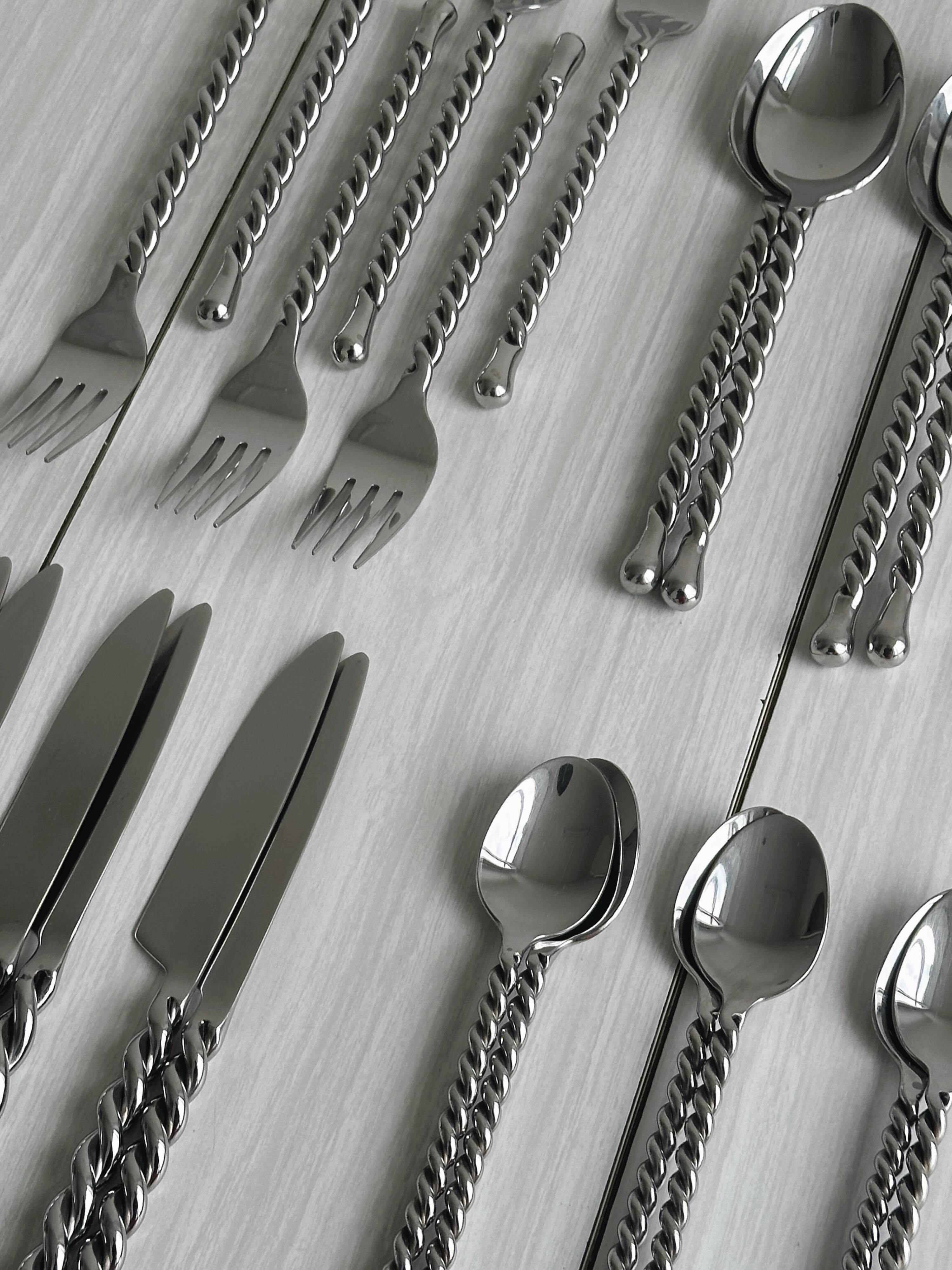24 antique silver-plated twisted metal cutlery sets