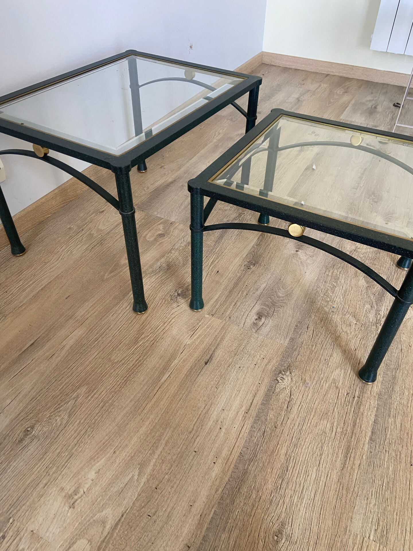 2 nesting tables from the 1960s in metal and bevelled glass.