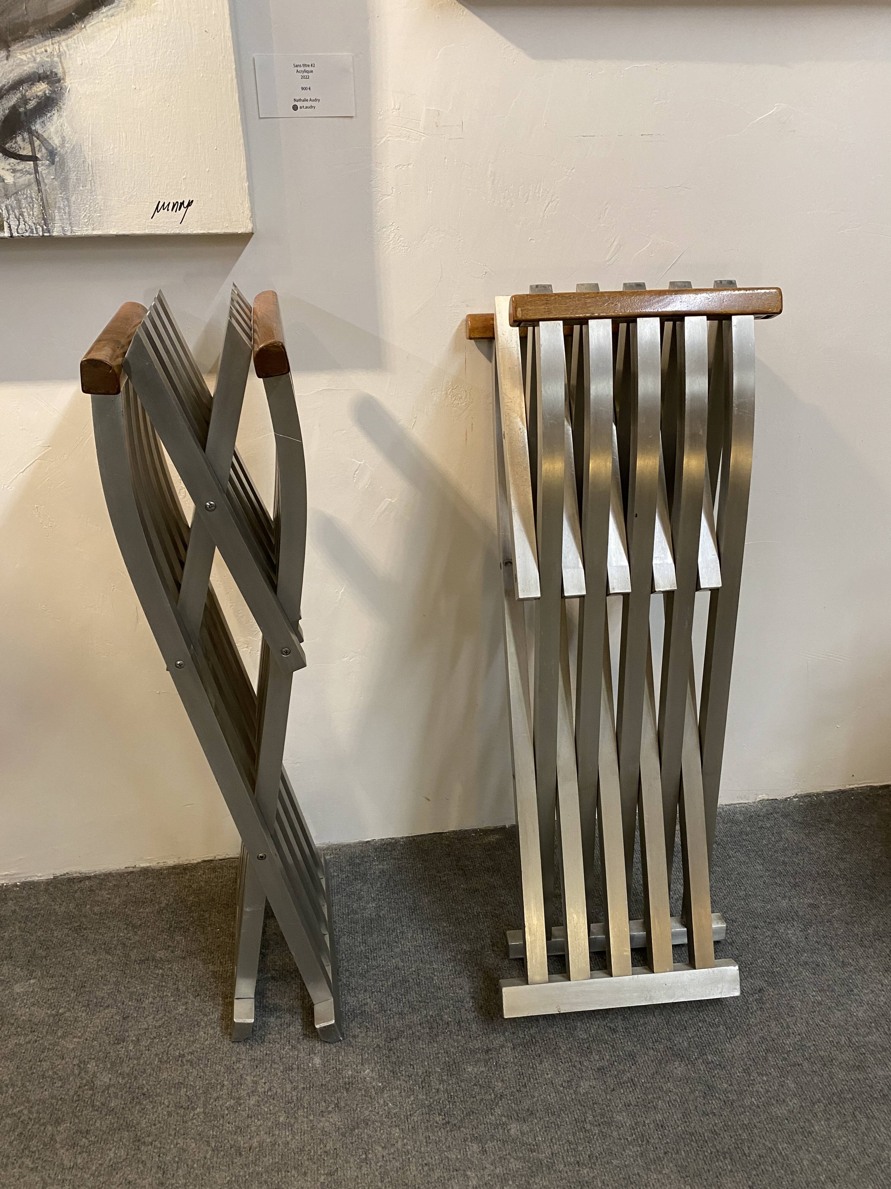 Pair of curule chairs designed by John Vesey, 1958, USA, brushed aluminum, walnut and leather