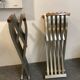 Pair of curule chairs designed by John Vesey, 1958, USA, brushed aluminum, walnut and leather