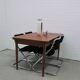 vintage set of x4 chrome tubular chairs black rib