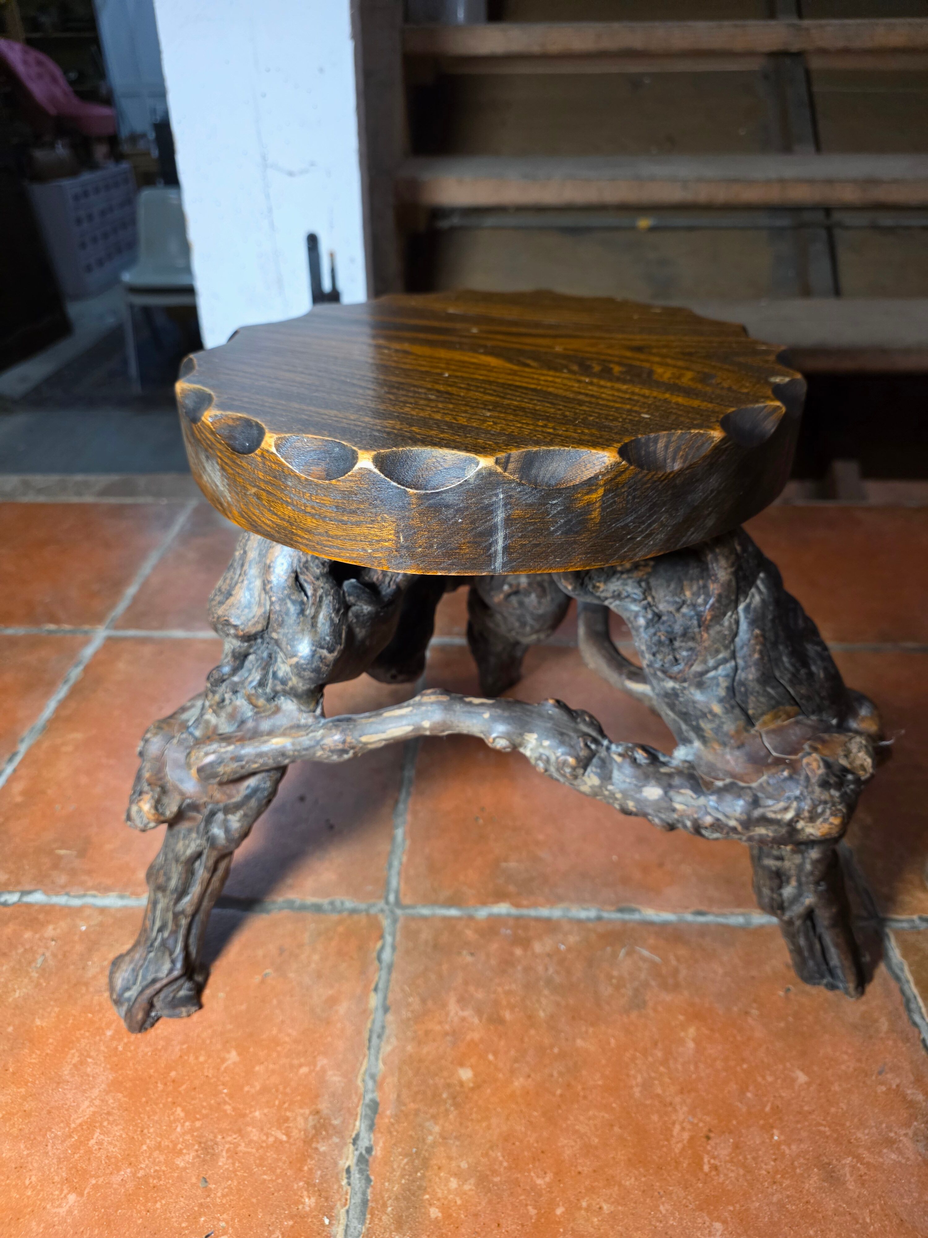 Pair of tripod stools with vine legs, oak top.