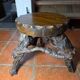 Pair of tripod stools with vine legs, oak top.