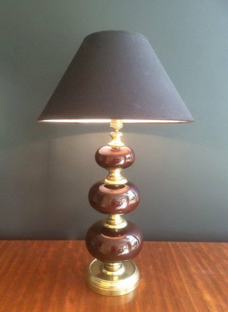 Lamp made of brass and red colored glass