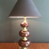 Lamp made of brass and red colored glass