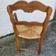 Provencal straw armchair in walnut