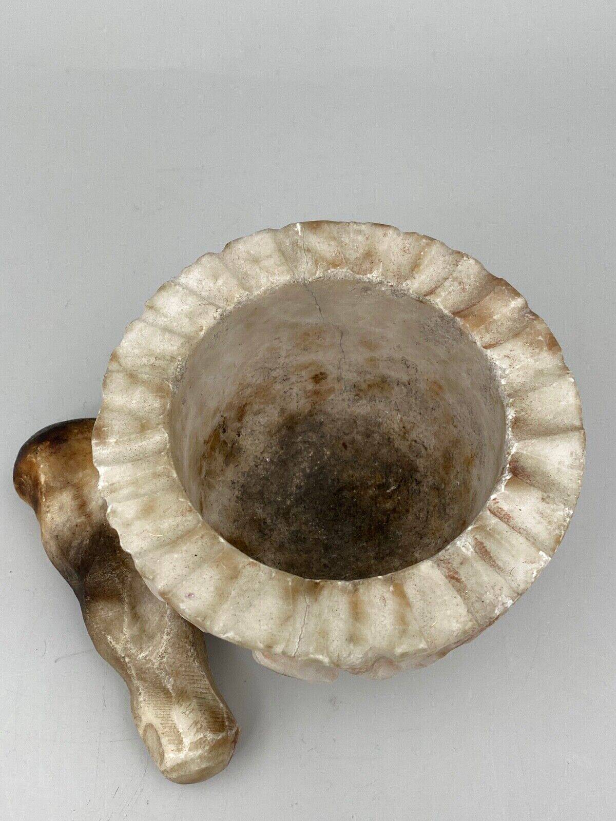 Pharmacy mortar and pestle in alabaster China man's face