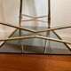 Smoked glass and gilded brass trolley