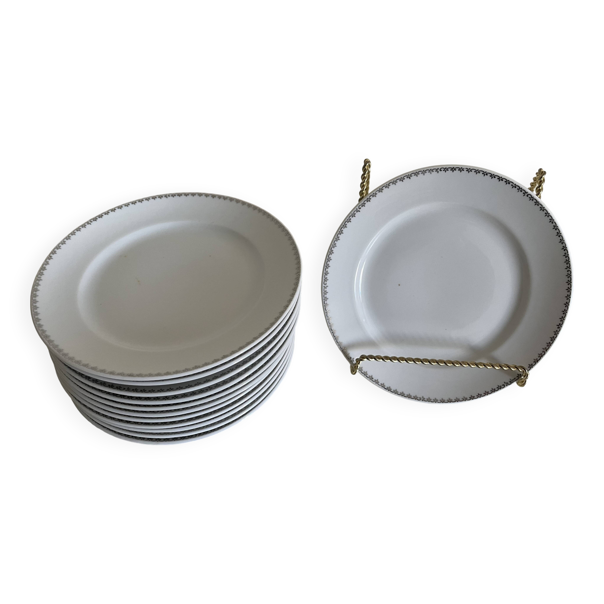 12 white porcelain plates with silver edging