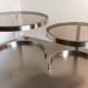 2 vintage 1970s smoked glass and brushed metal nesting coffee tables