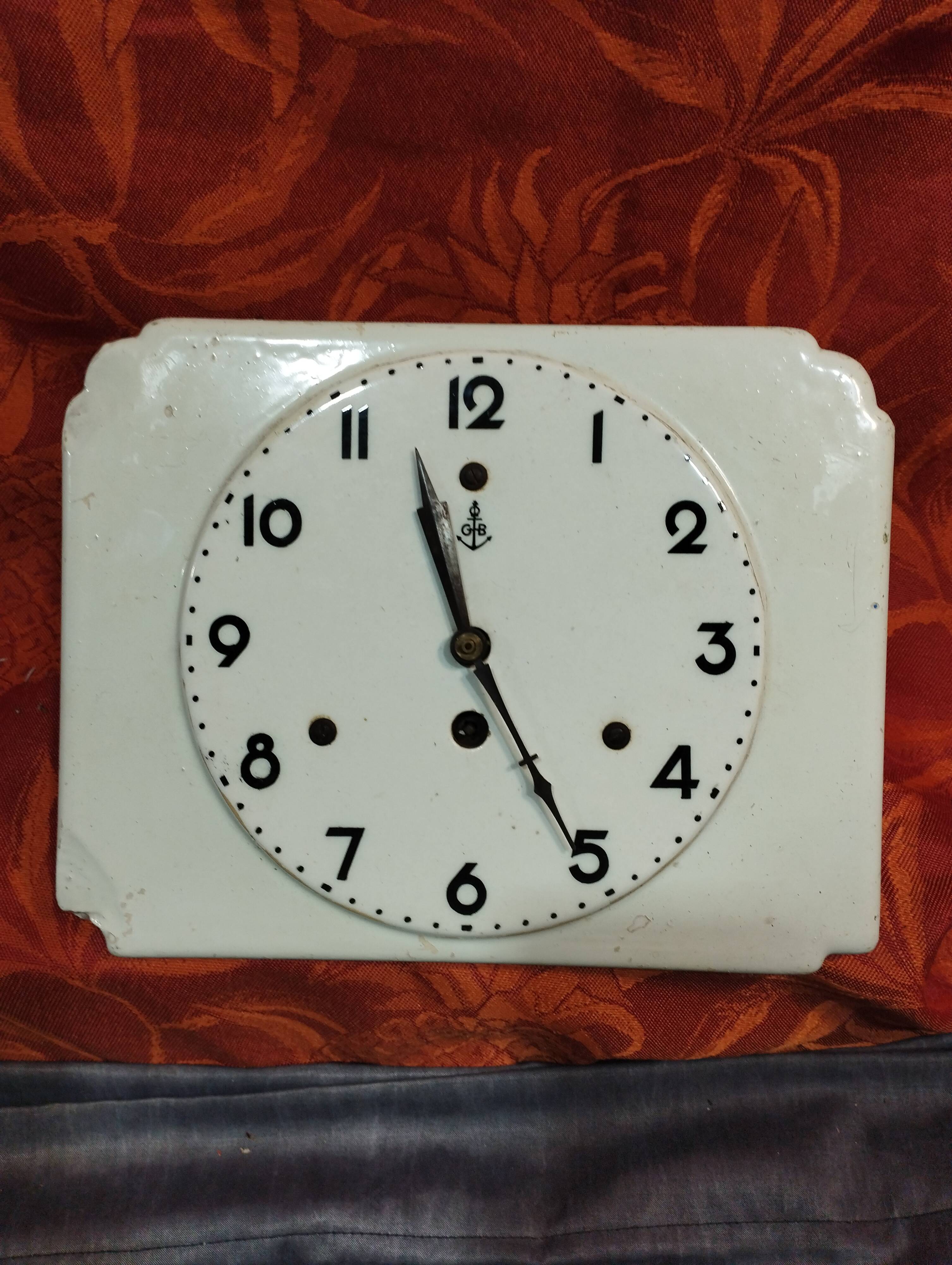 Small white art deco earthenware wall clock
