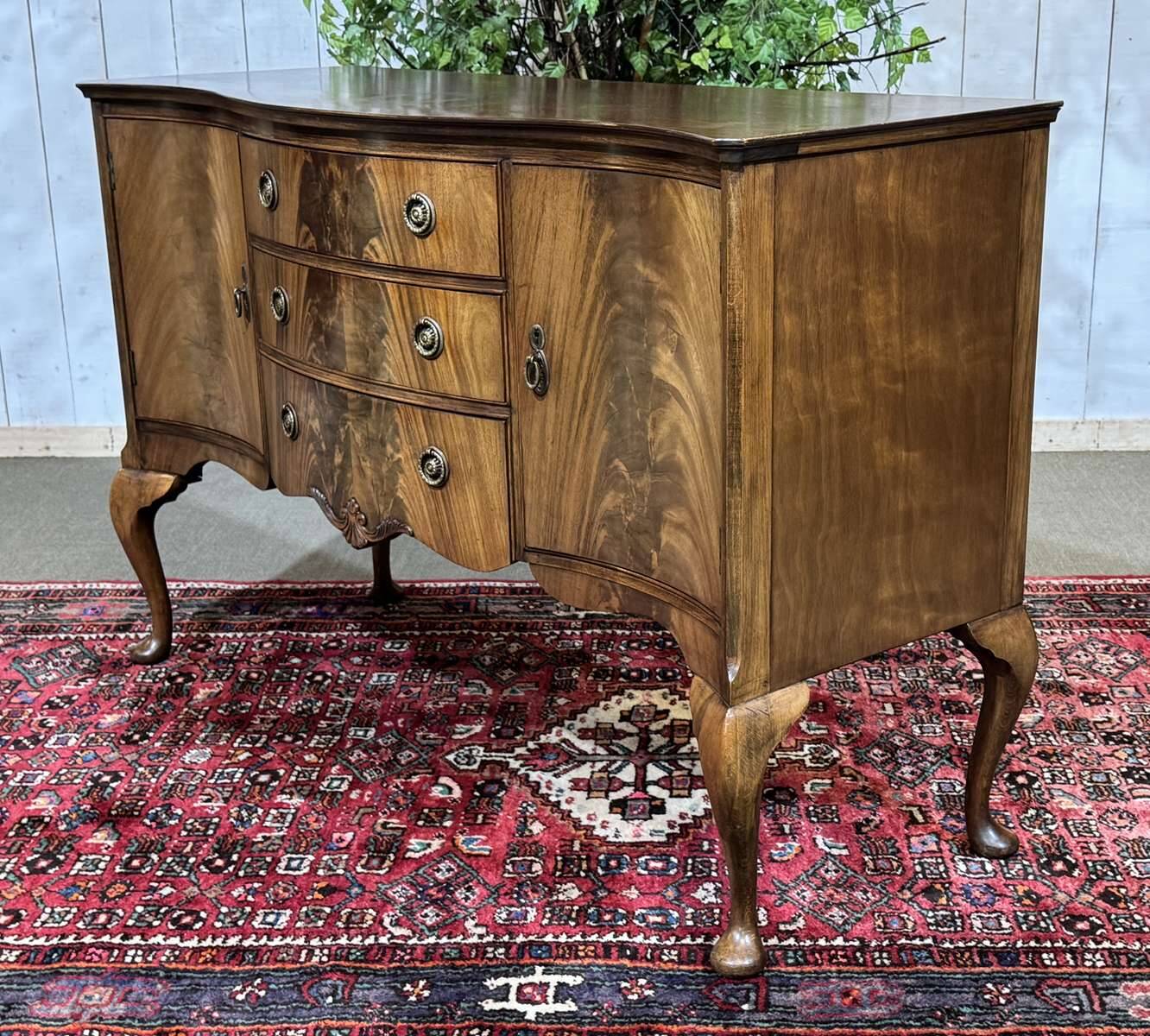 English Chippendale mahogany enfilade from the 1930s.