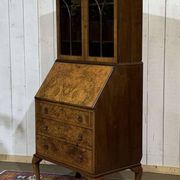 Scriban in English with a walnut finish from the 1930s.