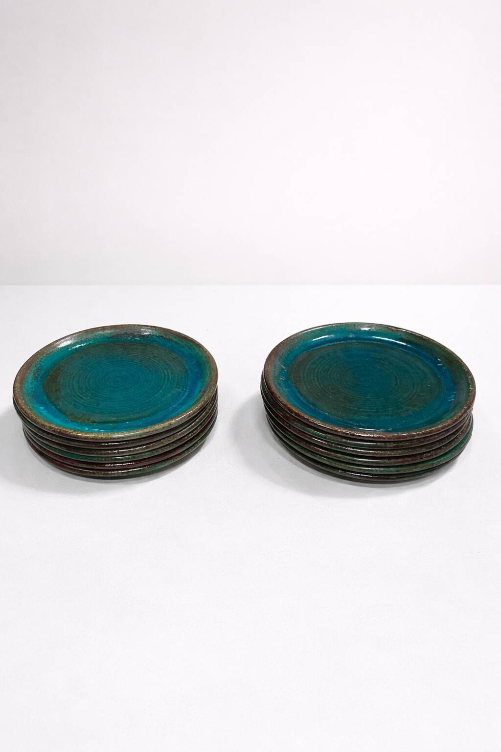 Set of 6 stoneware plates signed Tournay – Turquoise glaze – Vintage years