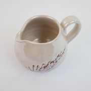 Pair of ceramic milk jugs signed La Roue Vallauris