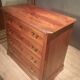 Small Louis Philippe chest of drawers with cut corners.