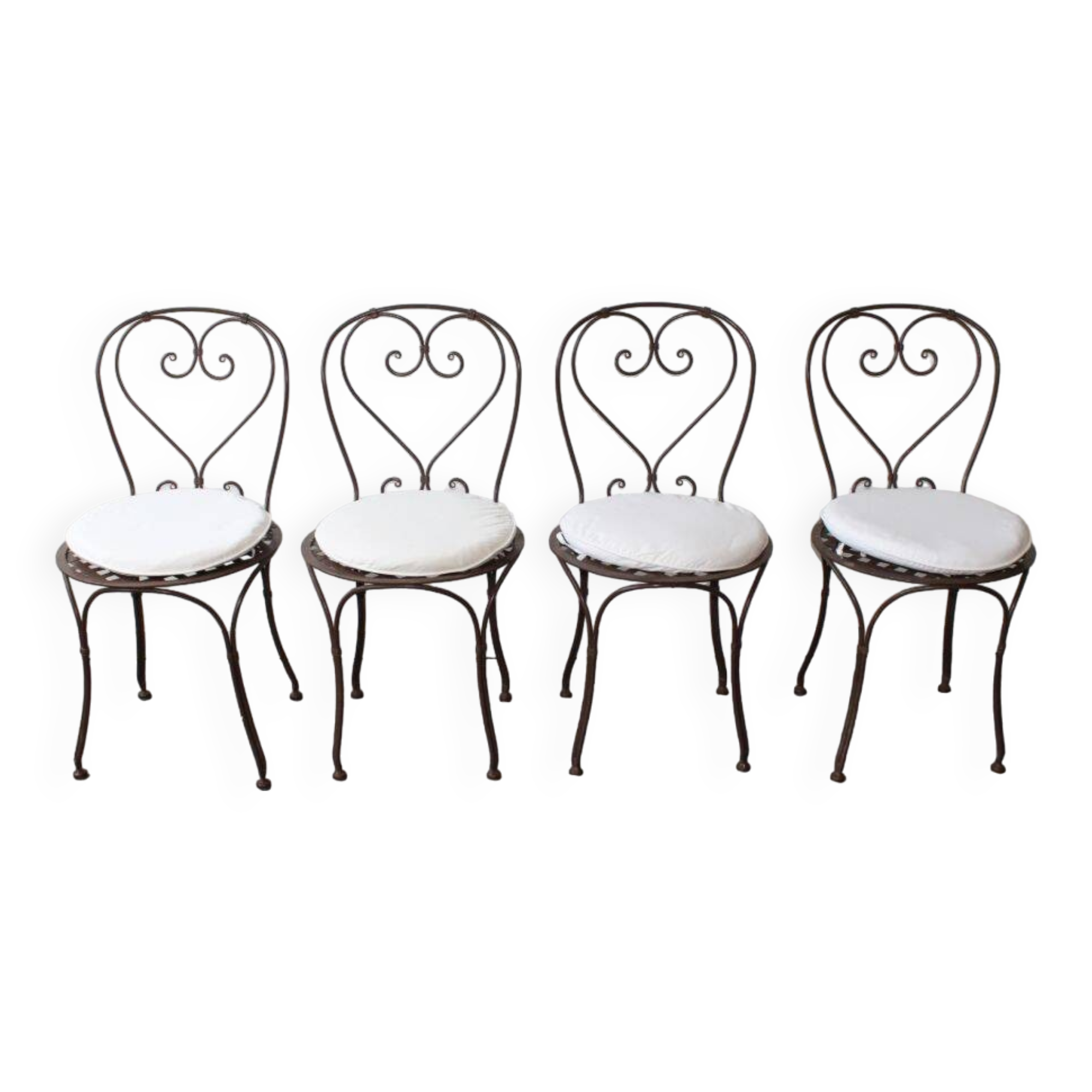 Set of 4 wrought iron chairs.