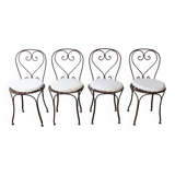 Set of 4 wrought iron chairs.