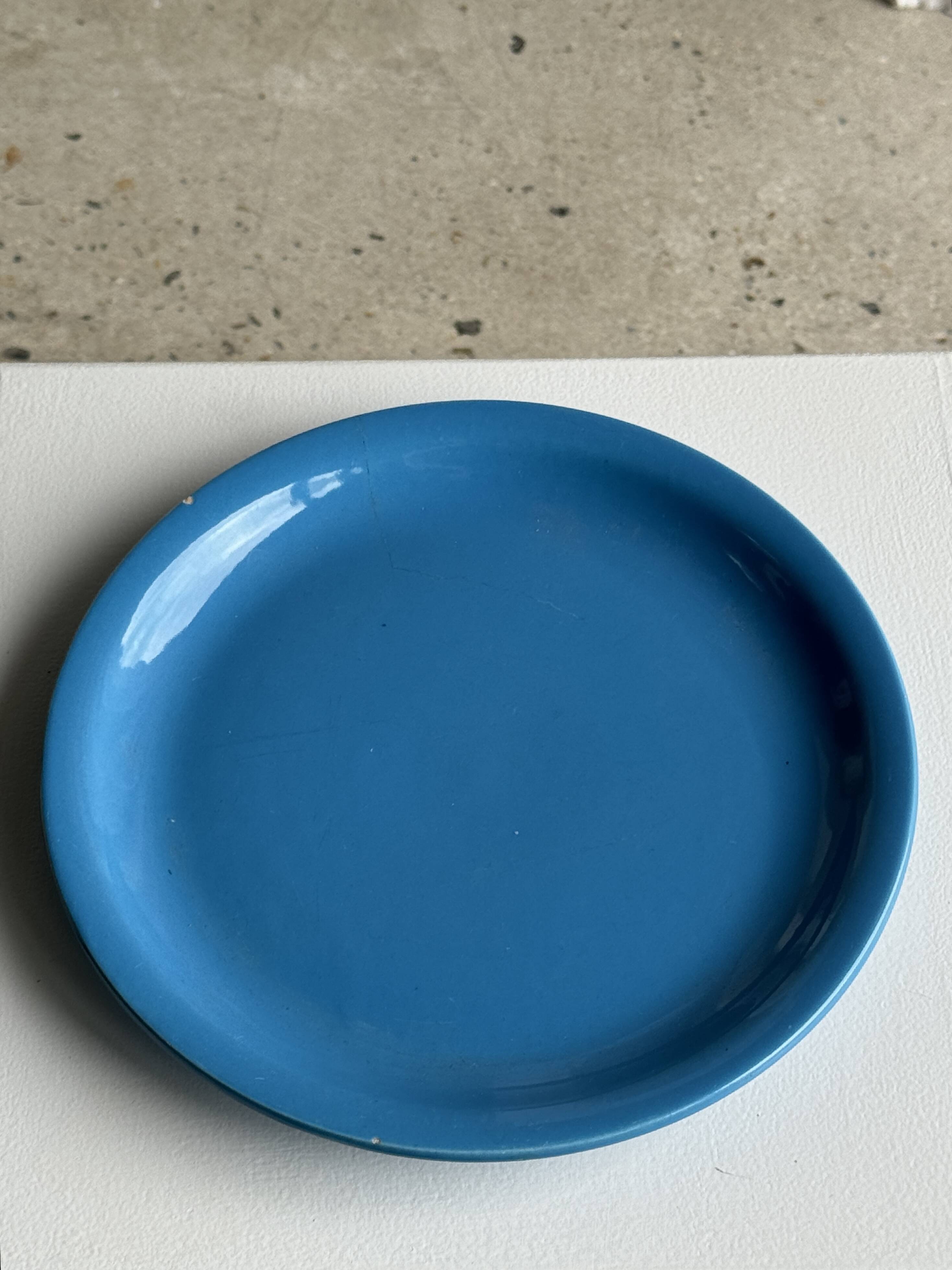 Set of 2 sky blue plates, one slotted